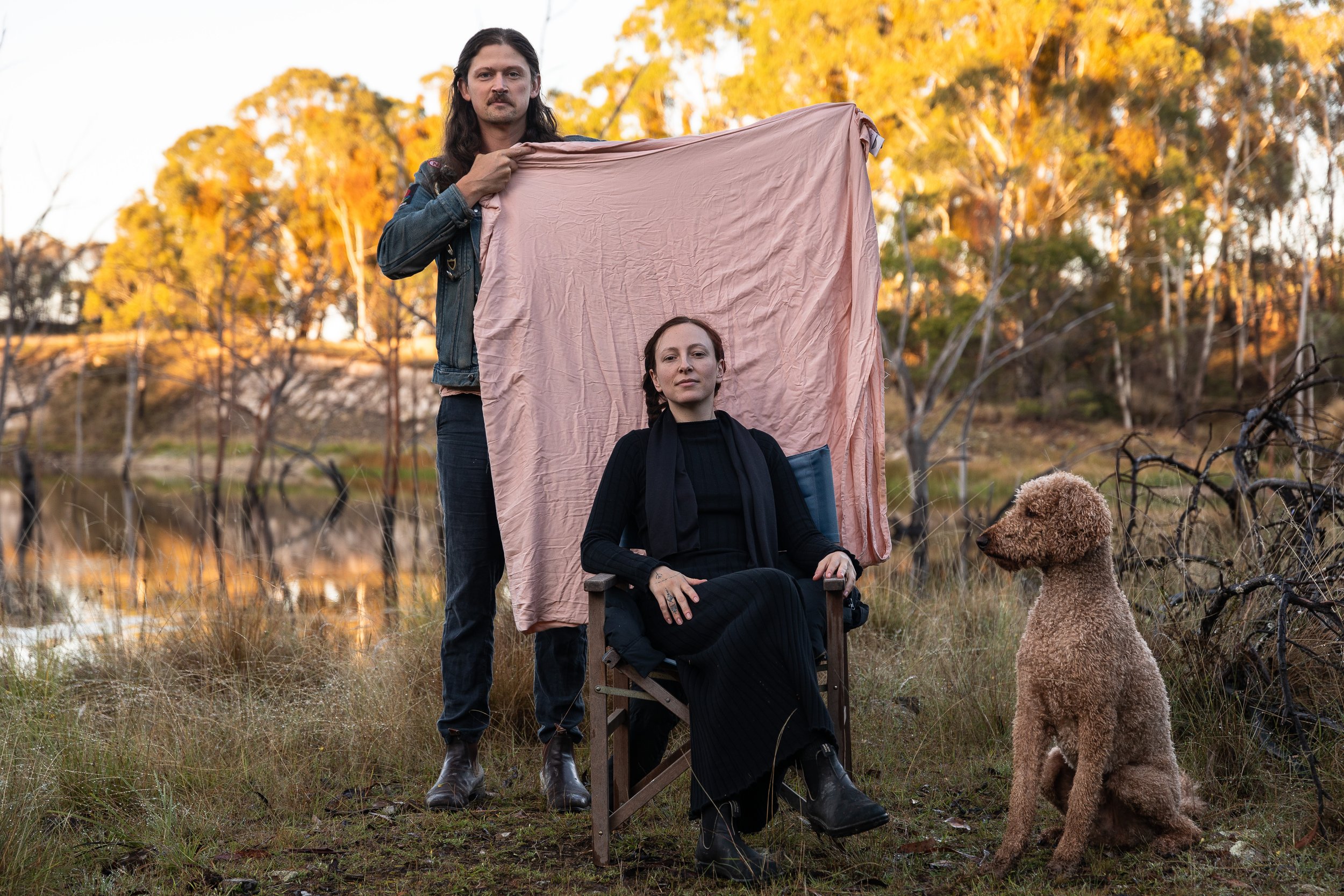 Jim A. Barker, Jamie Lee Garner and their poodle Joe at their house in Glen Innes